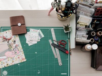 work desk with craft things on it
